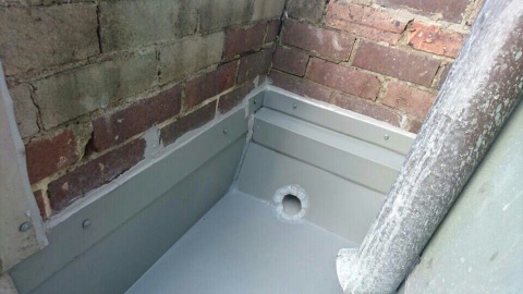 A Downpipe Guttering and downpipe.