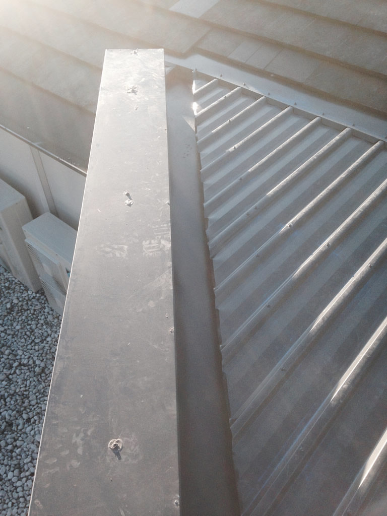 Metal gutter.